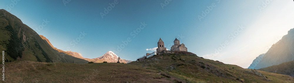 View of Kazbeg mountain and a cross, by the trinity church, Georgia