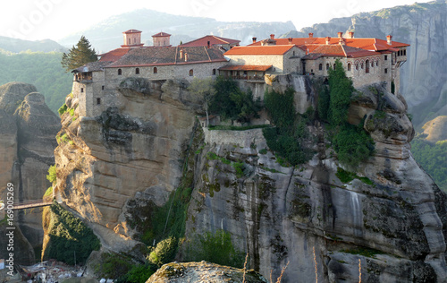 Greece, Meteora - a natural phenomenon of rocks resembling stone columns reaching 400 meters. At the peaks there are 9 Christian monasteries.