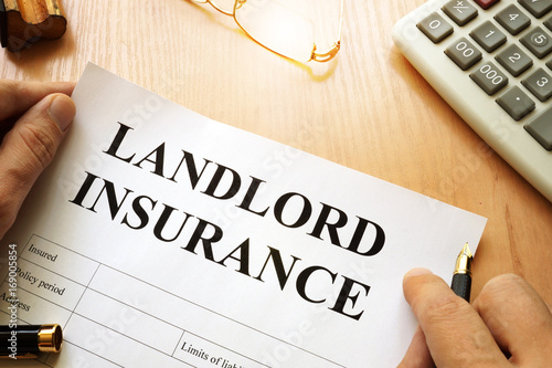 Принти на полотні Landlord insurance on a desk.
