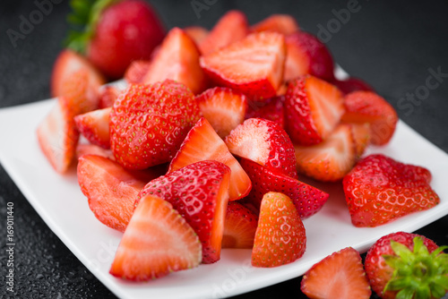 Portion of Chopped Strawberries on a slate slab