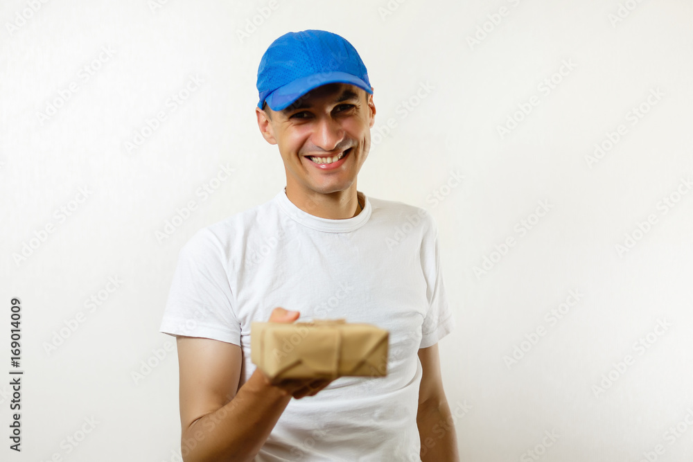 Delivery man with cardboard box on white background Delivery man with cardboard box on white background
