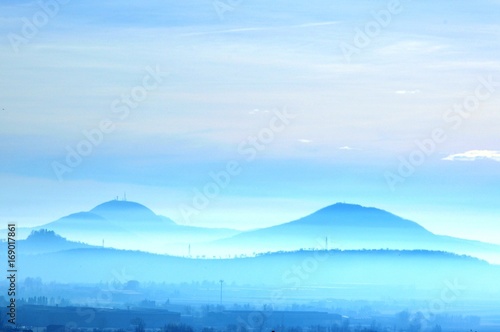 Fototapeta Naklejka Na Ścianę i Meble -  Blue fog on hills
