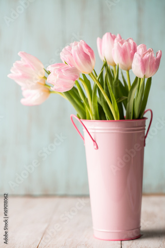 Fototapeta Naklejka Na Ścianę i Meble -  Pink and White Pastel Tulips in Pink Bucket Vase