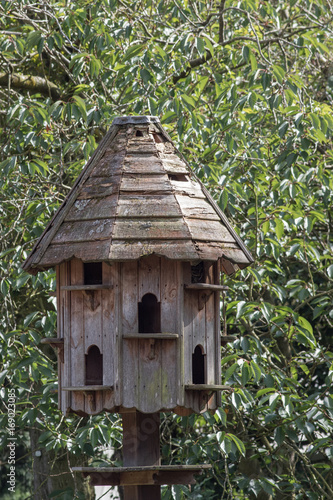 Traditional wooden dovecote. Free-standing dovecot. Wood house for doves and pigeons.