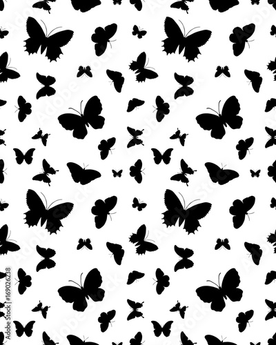 Seamless pattern with black silhouettes of butterflies on white
