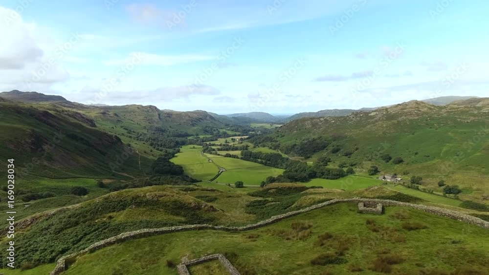 Stone wall ruins high in the mountains of the Lake District. Stone wall ruins high in the mountains of the Lake District.