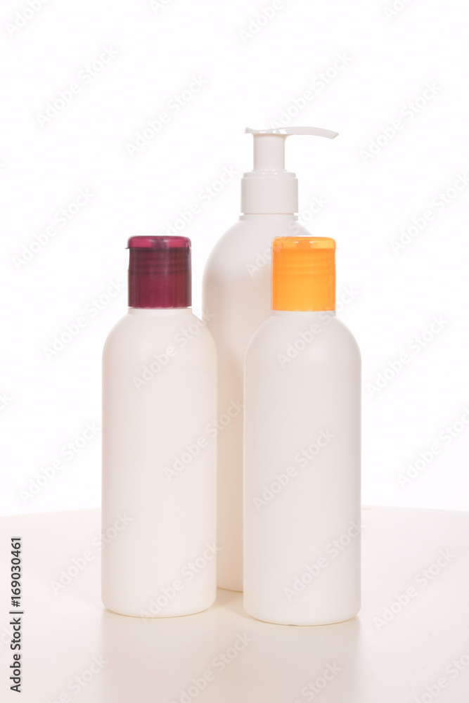 Cosmetics in bottles of plastic containers and tubes Cosmetics in bottles of plastic containers and tubes