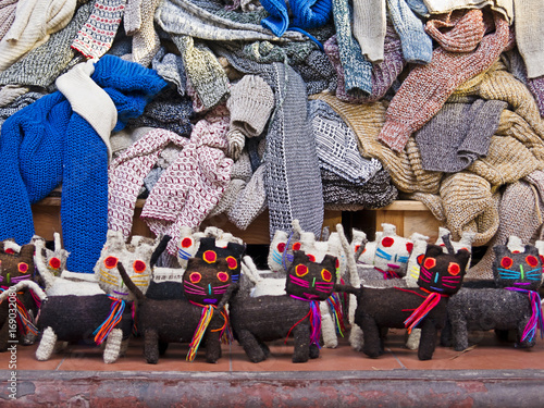 Traditional Mayan clothes and cat toys at street market, Playa del Carmen, Mexico