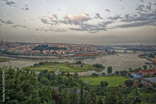 Istanbul (Turkey) panoramic daylight view from Pier Loti hill with clouds in sky in background