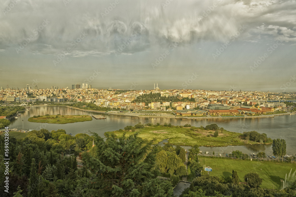Istanbul (Turkey) panoramic daylight view from Pier Loti hill with clouds in sky in background