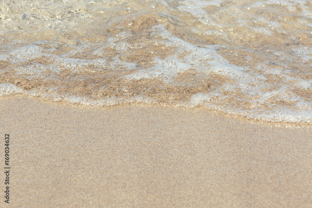 Soft wave of the sea on the sandy beach