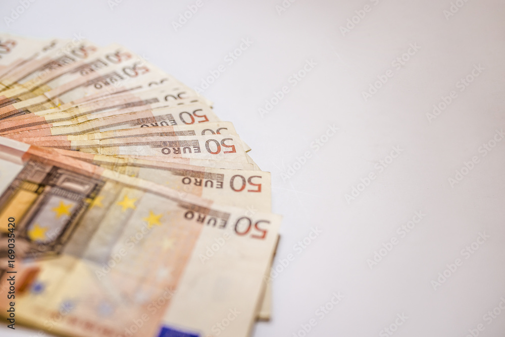 50 euro banknotes in a row. European Union Currency. Stack of 50 euro banknotes. 50 euro banknotes in a row. European Union Currency. Stack of 50 euro banknotes.