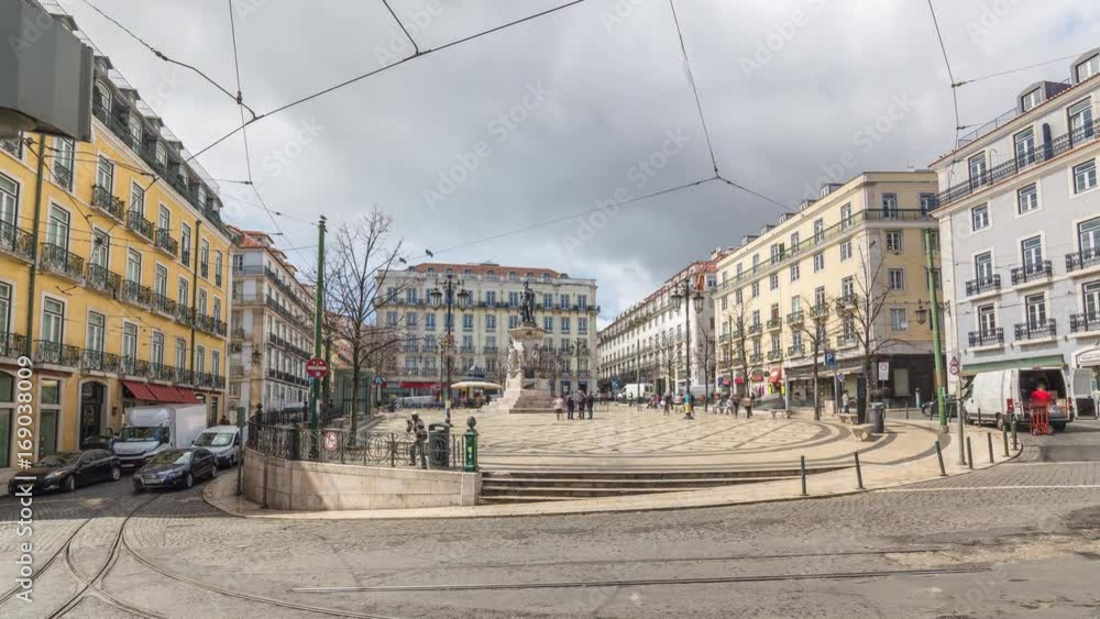 Timelapse of the Luís de Camões square with car traffic. Lisbon, Portugal. April, 2017 Timelapse of the Luís de Camões square with car traffic. Lisbon, Portugal. April, 2017