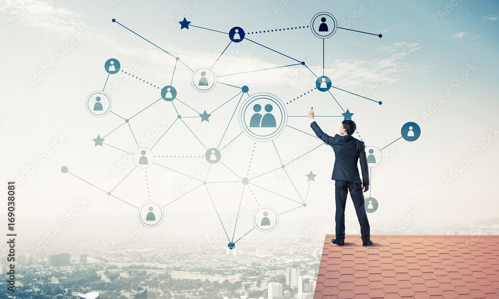 Businessman on house roof presenting networking and connection c Businessman on house roof presenting networking and connection c