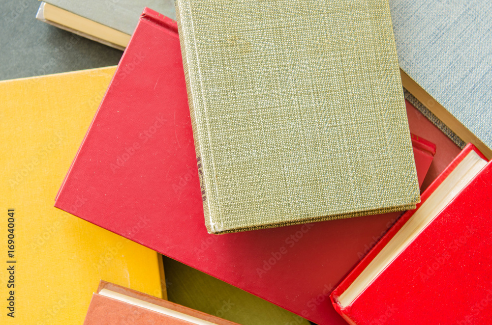Fototapeta premium a stack of colorful books