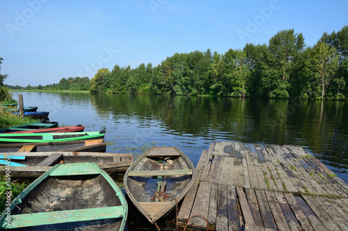 Boat dock on the river Andoga, Vologda region