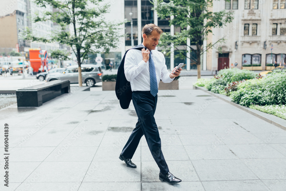 Handsome Senior Businessman on the Streets of Manhattan . New York City Handsome Senior Businessman on the Streets of Manhattan . New York City