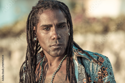Canvas-taulu portrait of black guy with dreadlocks
