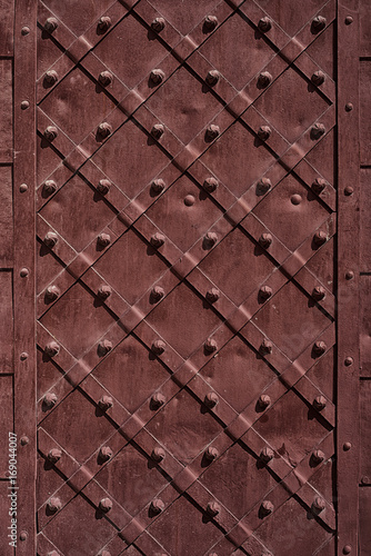 iron door closeup for texture or background, vintage style, brown color