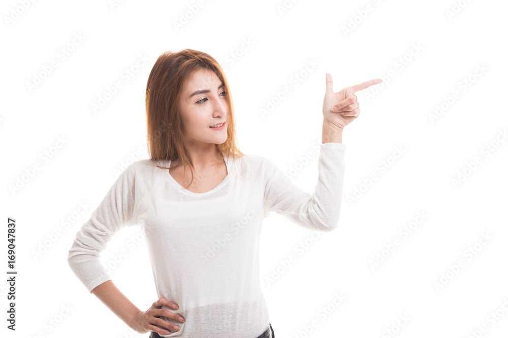 Young Asian woman smile and point.
