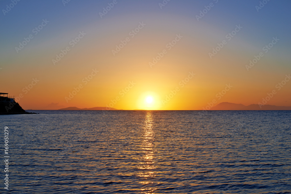 Sunset over water