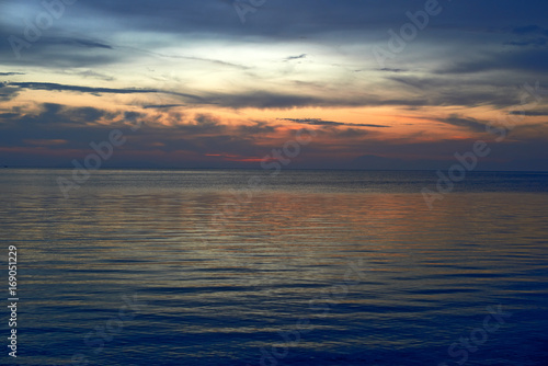 Sunset over water © Stilikone