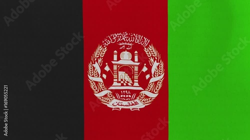 Loopable: Flag of Afghanistan...Afghan official flag gently waving in the wind. Highly detailed fabric texture for 4K resolution. 15 seconds loop. photo