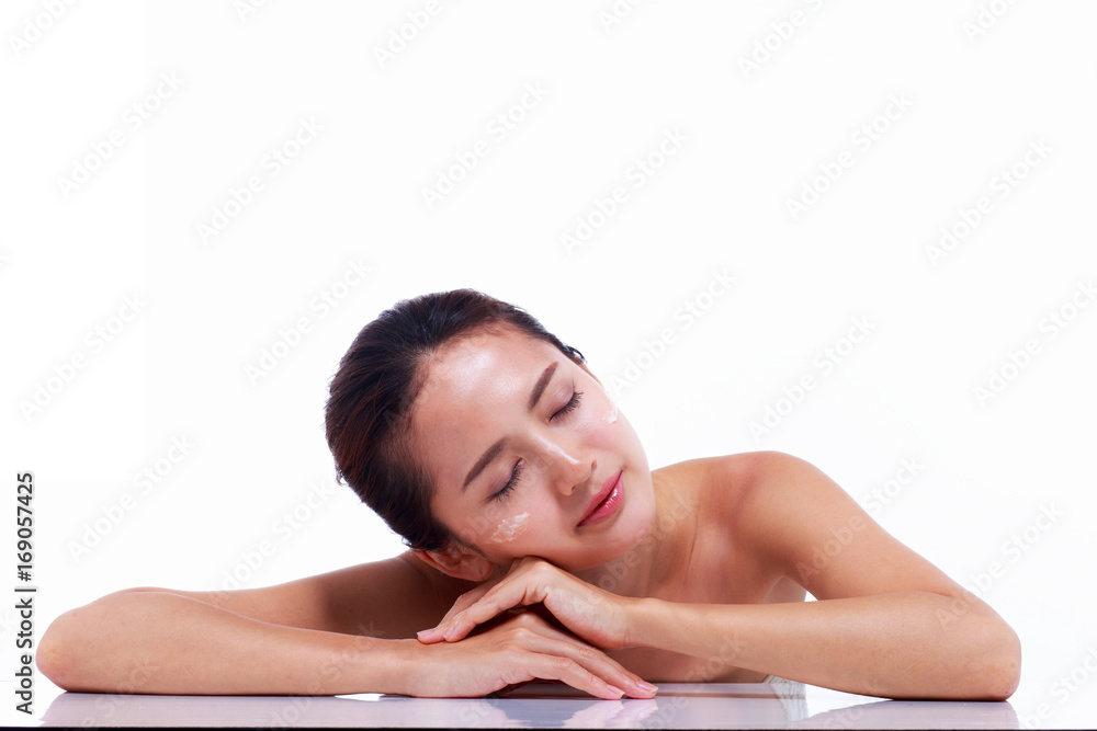 Close up, Beautiful Asian woman sleeps after cleansing her skin and skin care. Skin care and spa concept. Close up, Beautiful Asian woman sleeps after cleansing her skin and skin care. Skin care and spa concept.
