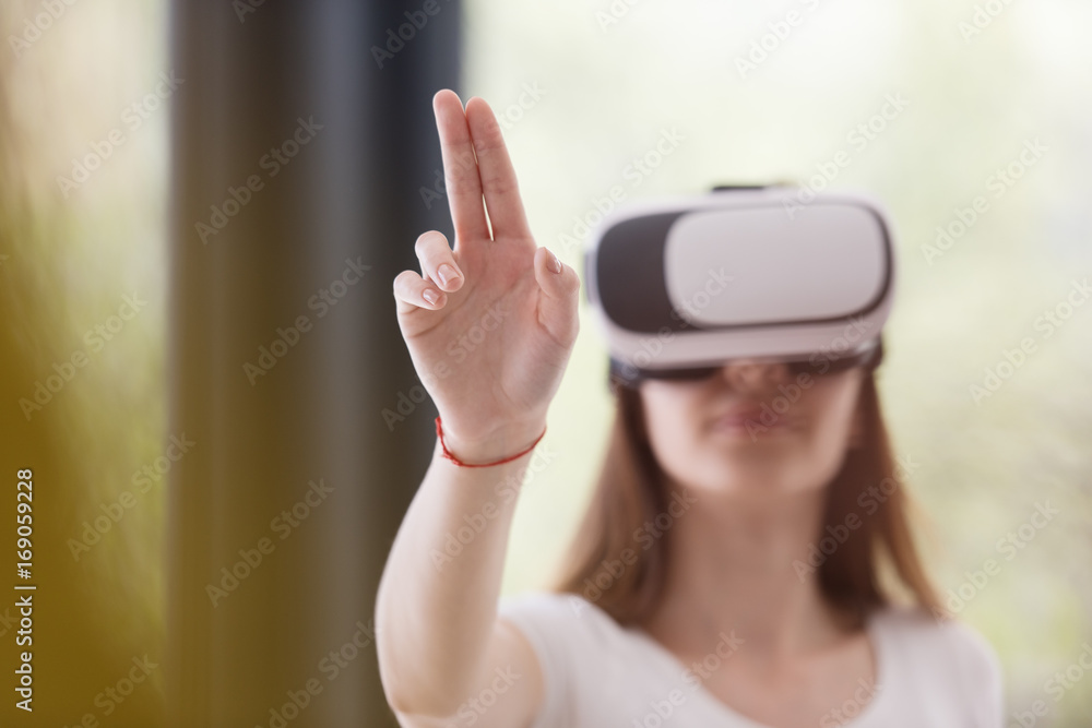 woman using VR-headset glasses of virtual reality woman using VR-headset glasses of virtual reality