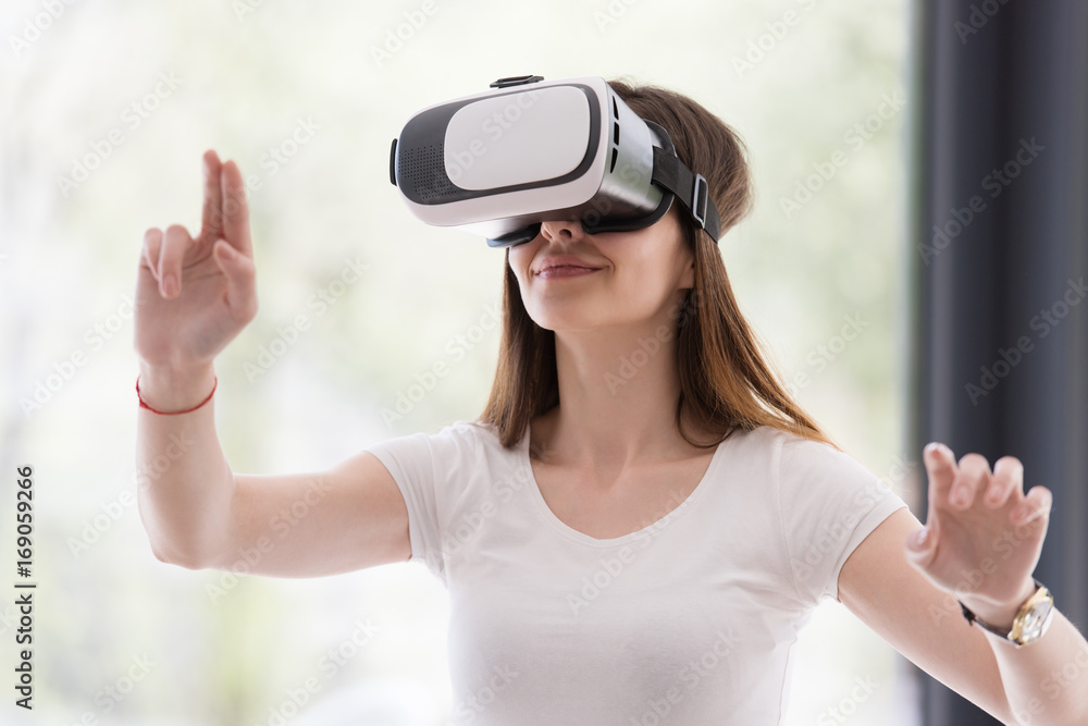 woman using VR-headset glasses of virtual reality woman using VR-headset glasses of virtual reality