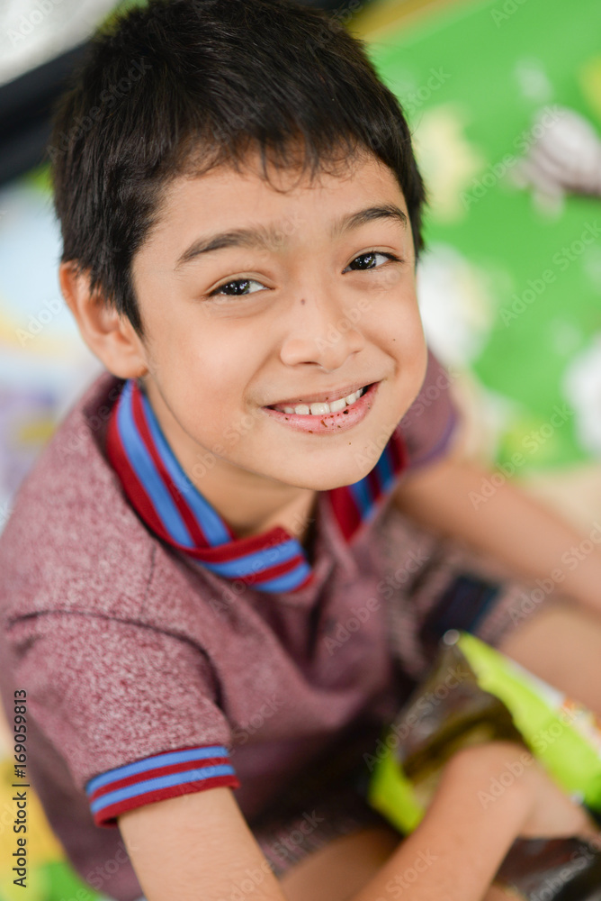 Portrait of smiling little asian boy close up Portrait of smiling little asian boy close up