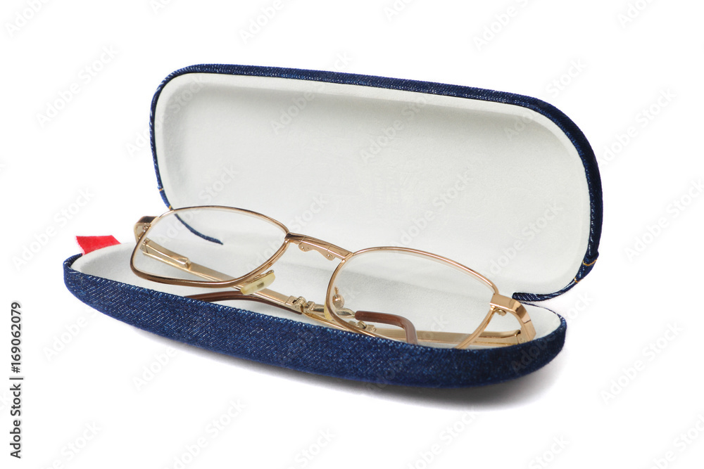 Spectacles in blue opened fabric case isolated on white Spectacles in blue opened fabric case isolated on white