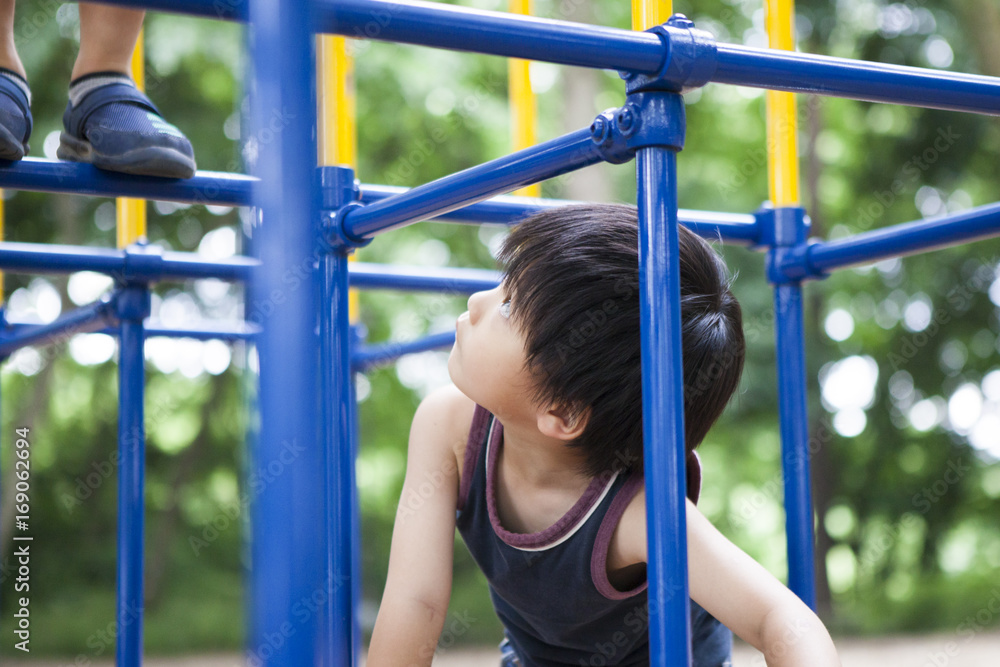 Fototapeta premium A boy looking up from athletics