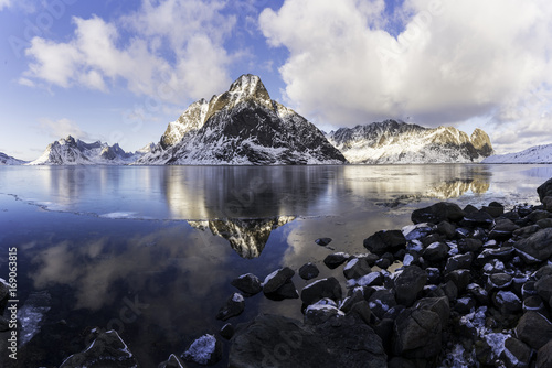 reflection of mountain chain in Lofoten