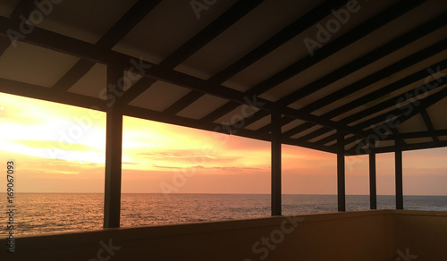 Fototapeta Naklejka Na Ścianę i Meble -  Sunset through the windows
