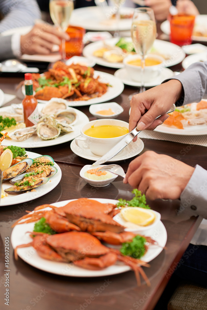 Enjoying seafood Enjoying seafood
