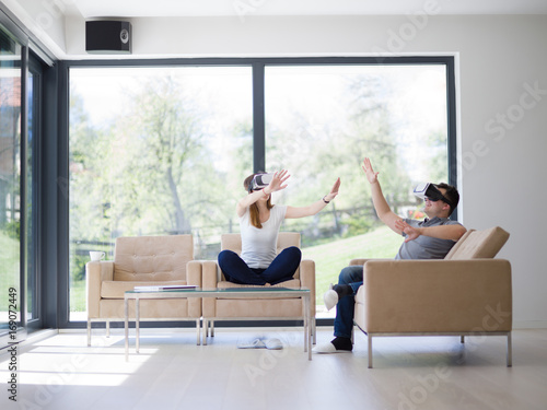 Couple using virtual reality headset
