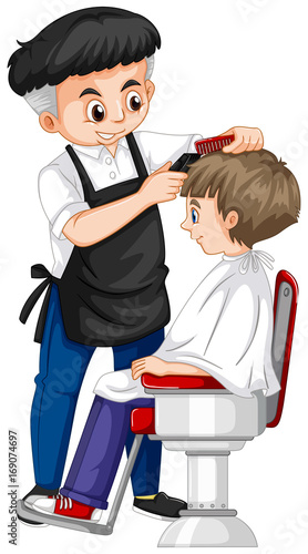 Barber giving boy haircut