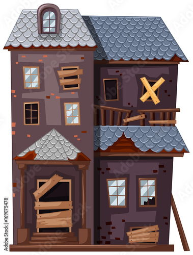 Ruined house with broken windows and door