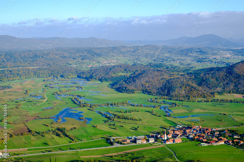 Planinsko polje is a typical karst field that is exposed to floods of the Unica river.