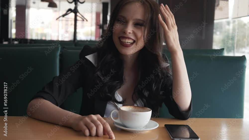 A girl is sitting in a cafe, in a business suit. The girl is very sexy and beautiful. Tell a story. A girl is sitting in a cafe, in a business suit. The girl is very sexy and beautiful. Tell a story.