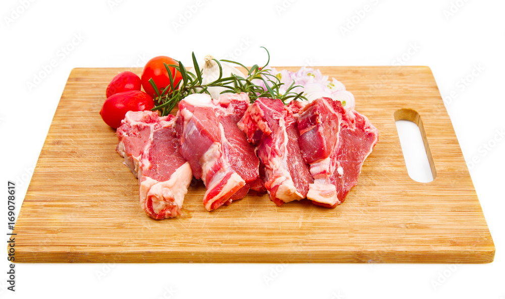 wood table with raw lamb meat wood table with raw lamb meat