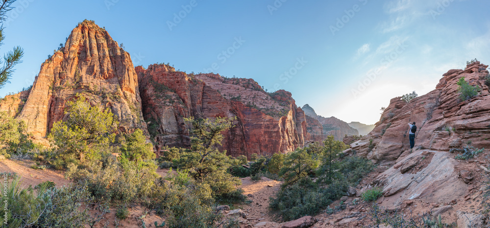 Man takes pictures of the amazingly beautiful Zion National Park, USA