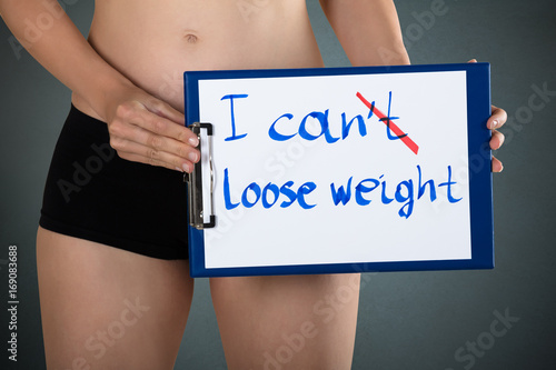 Woman Showing Message I Can't Lose Weight