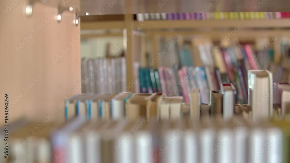 Shelves in a library are full of books of all kinds. Students have a variety of books to choose from. Shelves in a library are full of books of all kinds. Students have a variety of books to choose from.