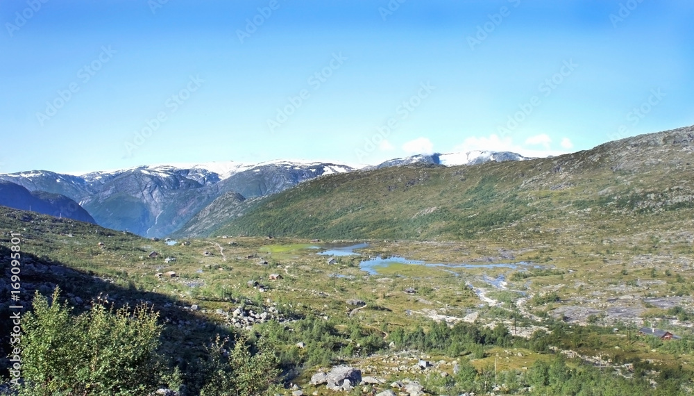Top view of valley between mountains, hiking way to Trolltunga cliff (The Troll's tongue), Odda, Norway