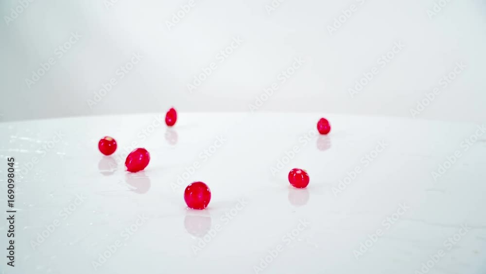 Lots of red radishes fall down on the table in the kitchen. Lots of red radishes fall down on the table in the kitchen.