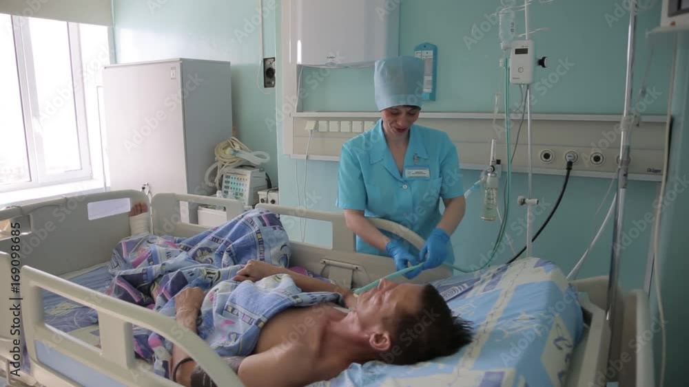 Beautiful nurse woman talking to a patient laughing and smiling Beautiful nurse woman talking to a patient laughing and smiling