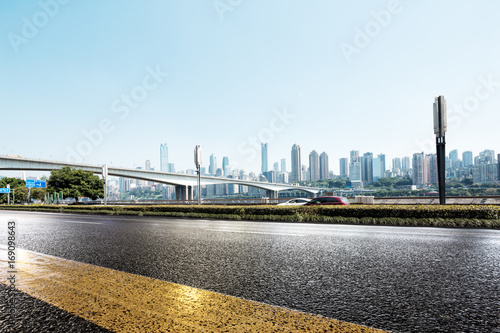 empty road and cityscape of modern city
