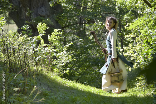 Nordic woman with hiking stick photo